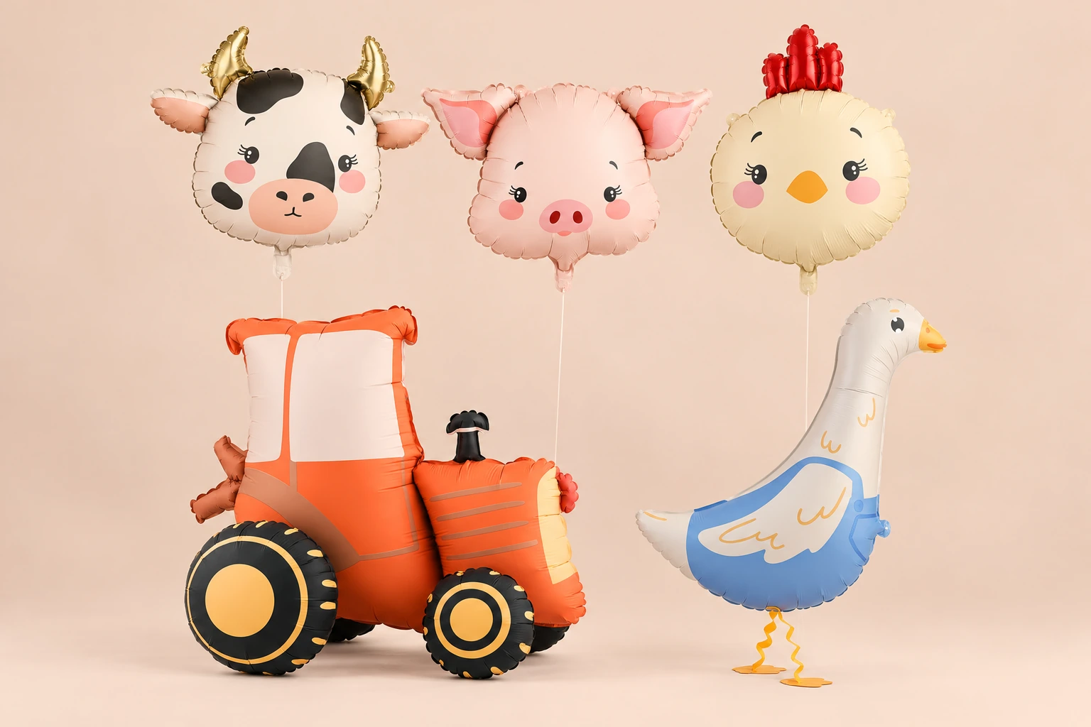 A coordinated family of cow, pig and chick head balloons, an orange tractor and a goose in blue overalls, on a clean apricot backdrop.